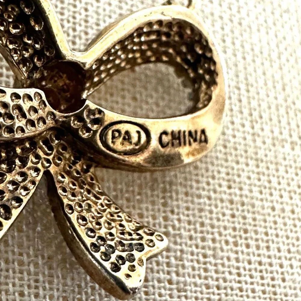 PAJ Silver and gold Tone Textured Bow Pendant Necklace - Picture 7 of 8